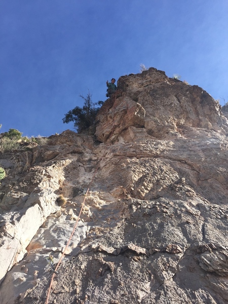 Jo topping out the FA on her route