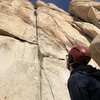 J man taking a lap, with Brian on belay