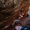 Kyle Harmon-Townsend relishing the perfectly spaced incut crimps of Pit BBQ, Rumbling Bald, NC. 
<br>
Insta: @dirtysouthclimber
<br>
Photo: Andy Wickstrom