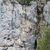 Eli getting into the final slab crux on La Esquina Famosa