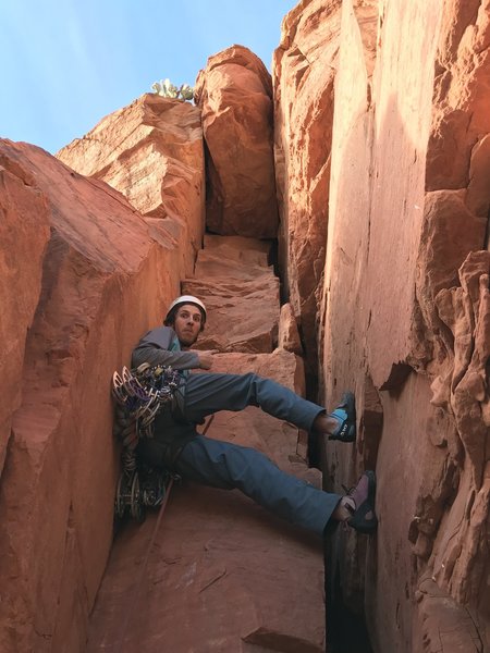 Gulp. Venturing up to the imposing roof crack on the first ascent. It went at 5.10 C1 the first time. Got the extra cams cause it's the ol' ground-up onsight. (Photo: Giselle Field)