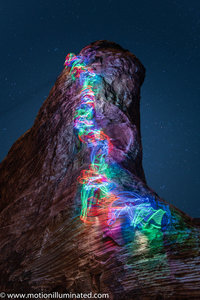 Long exposure shot with LEDs tied to climber