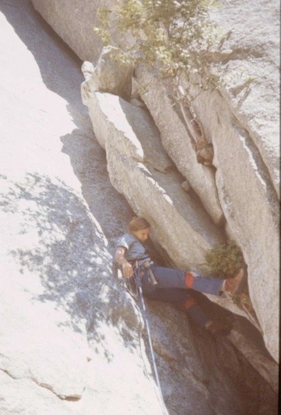 Catherine Freer starting up Ahab in 1972. Note the hammer-we used pitons then. Swami with tie-in moved to the side. She was bad-ass.