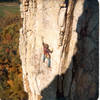 Horrendous Traverse 1972, 
<br>
swami webbing, vibram klettershoes, leather gloves for the hip belay, very little gear. The little red guidebook (in back pocket) lists this as both 5.5 and 5.5 A1 ??   Seemed about 5.7 at the time.