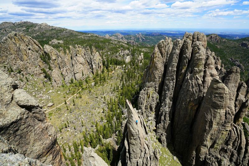 Aaron Costello climbing Eyetooth.