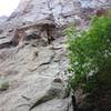 Looking up from the base of the route. Pitch 1 starts on the arete in the foreground and climbs into the corner.