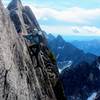 Jeromy on an exposed traverse of the upper ridge.