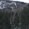 Cascade Ice Dance as seen from Lower Cascade Lake  - climbers right of a knob on the cliff.