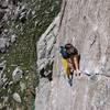 Navigating the crux.
<br>

<br>
Photo: Mike Hauck.