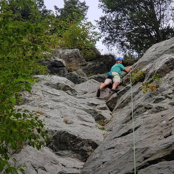 Dave topping out on his first Rock Climb!