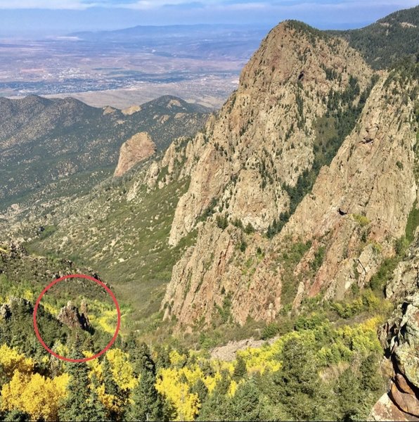 The feature circled in red is not the Candle, but the spire pictured in Margie's comment below (the Mummy). This photo was taken looking NW, and from the same overlook, the Cake and Candle are to the SW (left and out of frame) adjacent to Muralla Grande.