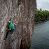 Taylor working his way out of the dihedral on the first ascent.