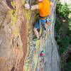 Starting the upper face crux sequence.
<br>

<br>
Photo by Chris Weidner.