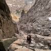 Rappelling the steep class-4 gully left of "catwalk" about 1 pitch up from catwalk ledge. AUG2019