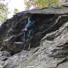 Anthony pulling the crux roof. Sweet moves!