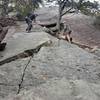 We were belaying from just below first bolt with an 80m rope. There is about 5 feet of rope left on the belayer's side.