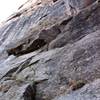 Looking up from base of the route at pitch 1. The climbers are on pitch 2.