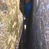 James getting to the top of the squeeze chimney.