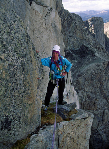 Mike Keating near the top of the route not long before the thunder and lightning. The upper section of the route seems to have alot more feldspar than granite.