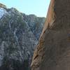 Keigan Tobin on lead about to hit the thin, reachy crux. Watch out for exfoliating rock on the right wall!