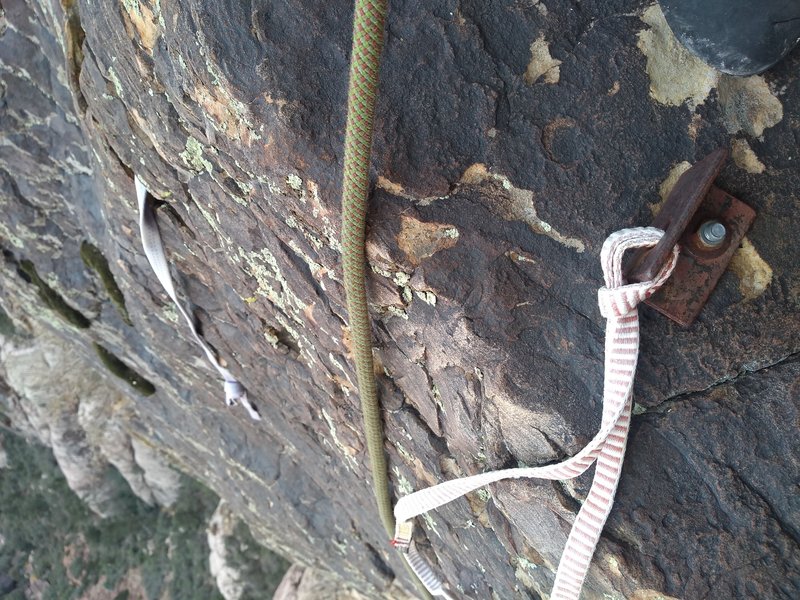 The relic marking the 3rd pitch belay ledge.