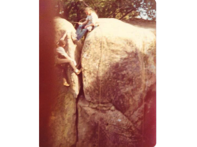 Bill Price tops out on the classic Rattle Snake Rock crack.