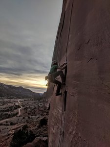 Chris highstepping into the hand crack.