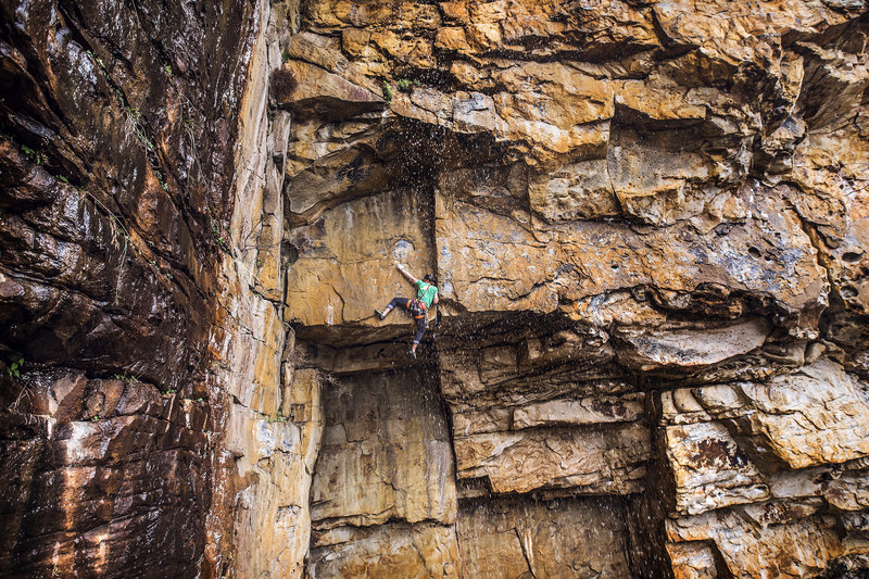 Jared Leader pulling over the crux roof