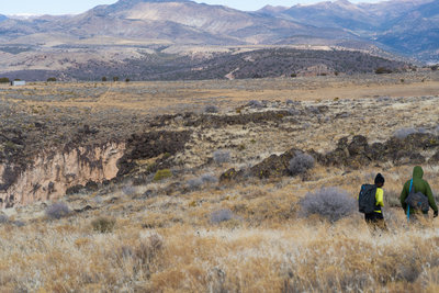 Hiking into the Underworld. This is before you drop down into the canyon. You can see the bright basalt cliffs on the north side.