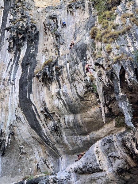 Climbers on the first two pitches of Humanality.