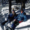 Mary Erdei and Ken SIms enjoying the warm afternoon sun while pausing in the 'rut' while descending from the 'Dike' in March 1980