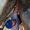 Marcos moments before the crux, right hand ready for the far crimp.