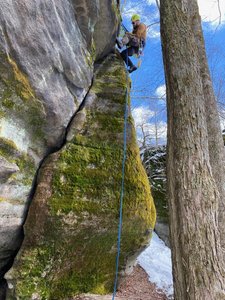 The crack portion of the route, taken during cleaning process. most of the moss on the right of the crack is gone now, though it didn't open up a lot of foot holds to help pull the crux.