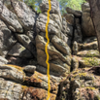 Yellow line is the basic route. Lower section and to the right are "steps" for the beginner. Lower left for intermediate. The spire above has many options - the left arête is the easiest line.