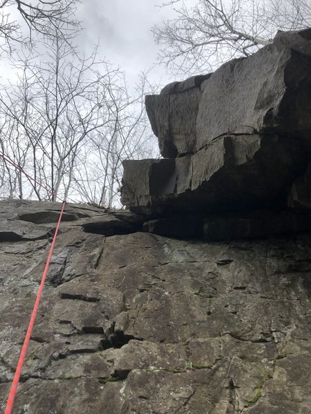 About halfway up the wall over hangs at the top and bottom