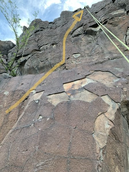 Showing bolts to anchor, rope is tied into the anchor for this route pulled to the side