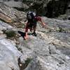 Classic Teton Scramble - Patty Black on the East Ridge of Symmetry Spire - 08 August 2004