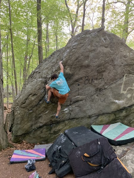 Johnny working up the arete.