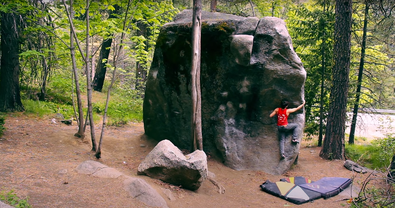 Jake Love starting the right arete of The Fridge Boulder.