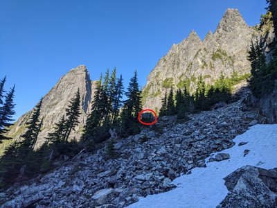 Approach: Pass just above this large flat-topped boulder near the first set of trees (as noted in the Approach description).