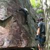 Matt Kessel getting through the difficult start with Marty Zender belaying.