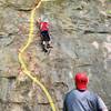 Line of the route in yellow. Hand holds marked with red X. Route is polished down low, and felt a lot harder than 5.9+ to lead.