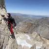 Coming around the arete with some exposure on the 5th pitch!