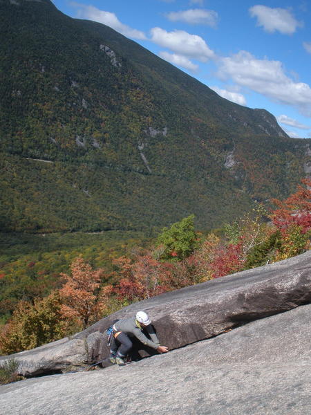 Josh LeMay climbing the corner on P3 with Mt Willie in the background and the Rt 302 and RR "cuts" showing.