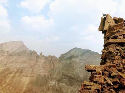 Long's Peak, Keyboard of the Winds, and Pagoda Peak behind the summit of Spearhead.