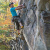 Pulling out of the upper major crux and on to a redpoint! Photo by Caleb Hills.