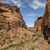 NW Wall of Keg Springs on the right, with some of the 5.11 finger cracks. Route: Keg stand across the canyon on the left.