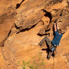 Andrew leading through the juggy but delicate lower section.