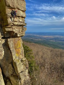 Taking in the view before final moves of the onsight.