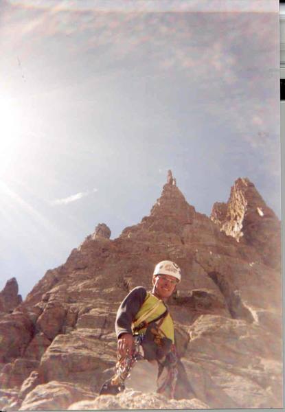 Chris Fisher, big smiles after a successful summit of Petit Grepon by way of the South Face.